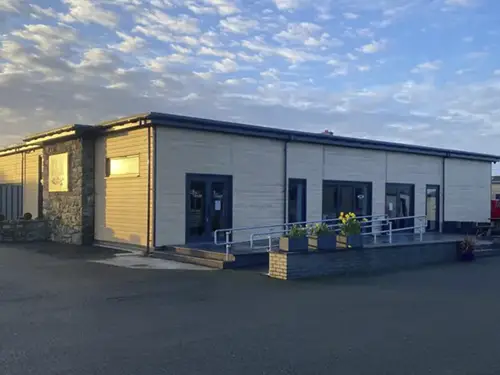 Create new patio area for customers to enjoy 